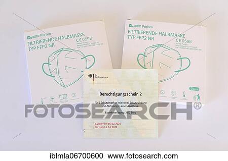 Stock Image - 2 packs FFP2 masks, Corona protective masks for mouth and nose, certificate of authorization, Covid 19, Germany, Europe. Fotosearch