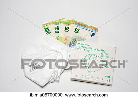 3 FFP 2 masks, 1 pack FFP 2 masks in front of envelope with € banknotes, corruption, Bavaria, Germany, Europe View Large Photo Image Stock Image - 3 FFP 2 masks, 1 pack FFP 2 masks in front of envelope with € banknotes, corruption, Bavaria, Germany, Europe. Fotosearch