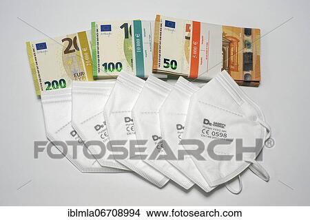 6 FFP 2 masks in front of 200, 100, 50 € banknote bundles, corruption, Bavaria, Germany, Europe View Large Photo Image Picture - 6 FFP 2 masks in front of 200, 100, 50 € banknote bundles, corruption, Bavaria, Germany, Europe. Fotosearch