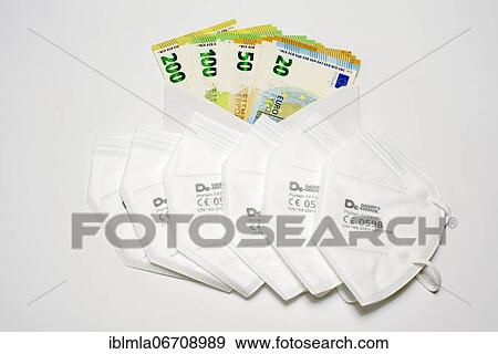 6 FFP 2 masks in front of envelope with € banknotes, corruption, Bavaria, Germany, Europe View Large Photo Image Stock Photo - 6 FFP 2 masks in front of envelope with € banknotes, corruption, Bavaria, Germany, Europe. Fotosearch