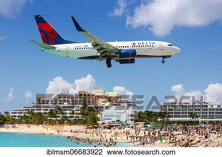 A Boeing 737-700 of Delta Air Lines with the registration N309DE at the airport St. Maarten View Large Photo Image Stock Image - A Boeing 737-700 of Delta Air Lines with the registration N309DE at the airport St. Maarten. Fotosearch
