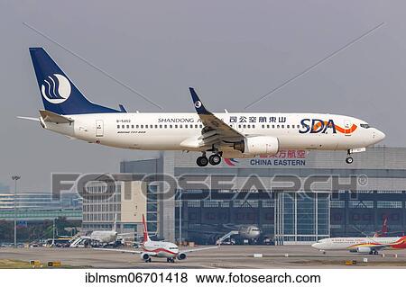 A Boeing 737-800 aircraft of SDA Shandong Airlines with registration number B-5452 at Shanghai airport, China, Asia View Large Photo Image Stock Photo - A Boeing 737-800 aircraft of SDA Shandong Airlines with registration number B-5452 at Shanghai airport, China, Asia. Fotosearch