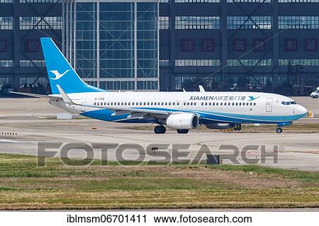 A Boeing 737-800 aircraft of Xiamenair with registration number B-1709 at Shanghai airport, China, Asia View Large Photo Image Stock Image - A Boeing 737-800 aircraft of Xiamenair with registration number B-1709 at Shanghai airport, China, Asia. Fotosearch