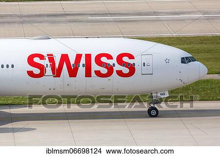 Picture - A Boeing 777-300ER aircraft of Swiss with registration HB-JNG at Zurich airport, Switzerland, Europe. Fotosearch