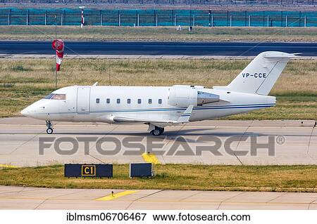 A Bombardier CL-600-2B16 Challenger 604 private jet with registration VP-CCE at Beijing Airport, China, Asia View Large Photo Image Stock Photo - A Bombardier CL-600-2B16 Challenger 604 private jet with registration VP-CCE at Beijing Airport, China, Asia. Fotosearch