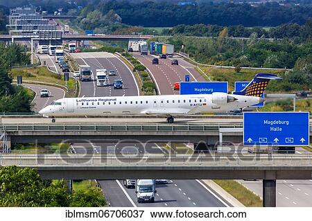 A Bombardier CRJ-900 aircraft of Lufthansa Regional CityLine with the registration D-ACNJ at Leipzig/Halle Airport (LEJ) in Schkeuditz, Germany, Europe View Large Photo Image Stock Photo - A Bombardier CRJ-900 aircraft of Lufthansa Regional CityLine with the registration D-ACNJ at Leipzig/Halle Airport (LEJ) in Schkeuditz, Germany, Europe. Fotosearch