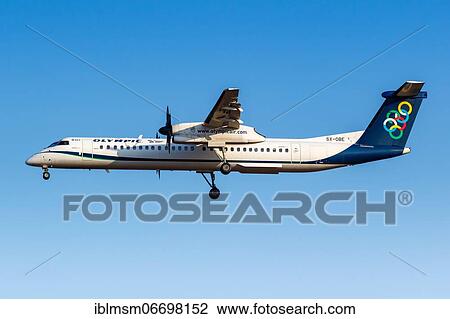 Stock Image - A Bombardier DHC-8-400 aircraft of Olympic Air with registration number SX-OBE at Athens airport, Greece, Europe. Fotosearch
