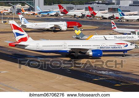 A British Airways Boeing 777-200ER with registration number G-VIIO at London Gatwick Airport, United Kingdom, Europe View Large Photo Image Stock Photograph - A British Airways Boeing 777-200ER with registration number G-VIIO at London Gatwick Airport, United Kingdom, Europe. Fotosearch