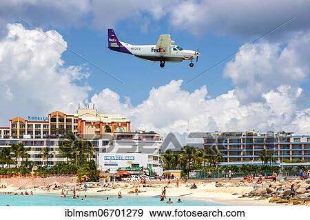 A Cessna 208 of FedEx Feeder with the registration N921FE at the airport St. Maarten View Large Photo Image Stock Photo - A Cessna 208 of FedEx Feeder with the registration N921FE at the airport St. Maarten. Fotosearch