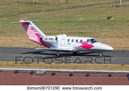 A Cessna 525 CitationJet 1 aircraft of the Pink Sparrow with registration OE-FMU at Dortmund Airport, Germany, Europe View Large Photo Image Stock Image - A Cessna 525 CitationJet 1 aircraft of the Pink Sparrow with registration OE-FMU at Dortmund Airport, Germany, Europe. Fotosearch