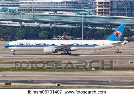 A China Southern Airlines Boeing 777-300ER with registration number B-7588 at Shanghai Airport, China, Asia View Large Photo Image Stock Photo - A China Southern Airlines Boeing 777-300ER with registration number B-7588 at Shanghai Airport, China, Asia. Fotosearch