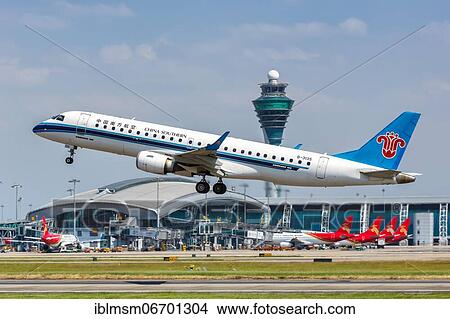 A China Southern Airlines Embraer 190 aircraft with registration number B-3135 at Guangzhou Airport, China, Asia View Large Photo Image Picture - A China Southern Airlines Embraer 190 aircraft with registration number B-3135 at Guangzhou Airport, China, Asia. Fotosearch