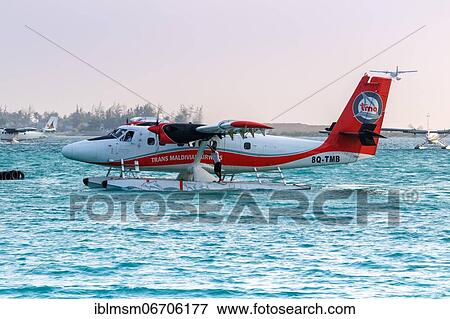 Stock Photo - A De Havilland Canada DHC-6-300 Twin Otter of TMA, Trans Maldivian Airways with registration 8Q-TMB at Male Airport, Maldives, Asia. Fotosearch