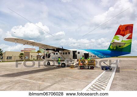 Stock Photo - A DHC-6-400 Twin Otter aircraft of Air Seychelles with registration S7-FAR at Mahe Airport (SEZ), Seychelles, Africa. Fotosearch