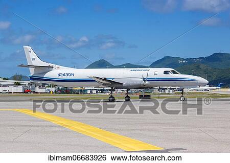 A Fairchild SA227-AT Expediter of Ameriflight with the registration N243DH at the airport St. Maarten View Large Photo Image Stock Photograph - A Fairchild SA227-AT Expediter of Ameriflight with the registration N243DH at the airport St. Maarten. Fotosearch