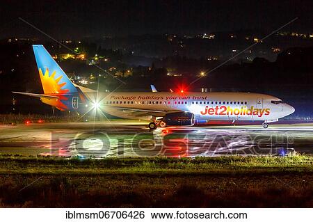 Stock Photograph - A Jet2 Boeing 737-800 with registration G-JZHK at Corfu Airport, Greece, Europe. Fotosearch