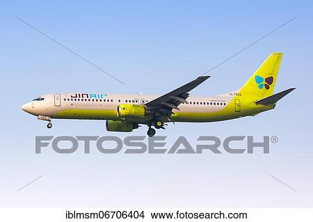 Picture - A JinAir Boeing 737-800 with registration HL7555 lands at Seoul Incheon Airport, South Korea, Asia. Fotosearch