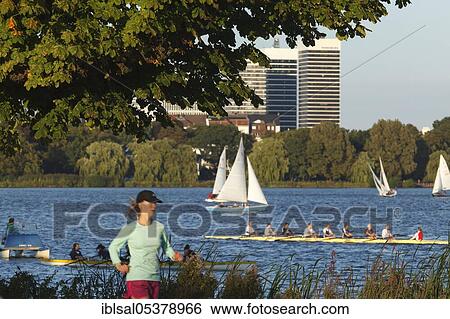 A jogger at Lake Alster in Hamburg, Germany, Europe View Large Photo Image Stock Photograph - A jogger at Lake Alster in Hamburg, Germany, Europe. Fotosearch