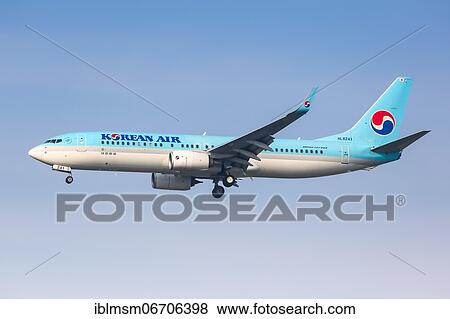 Stock Photo - A Korean Air Boeing 737-800 with registration number HL8241 lands at Seoul Incheon Airport, South Korea, Asia. Fotosearch