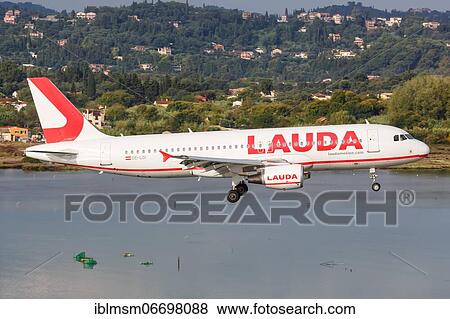 Stock Photo - A Lauda Airbus A320 aircraft with registration number OE-LOI at Corfu Airport, Greece, Europe. Fotosearch