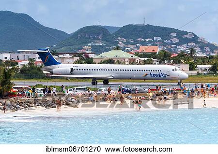 Stock Image - A McDonnell Douglas MD-82 of Insel Air with the registration PJ-MDE at the airport of St. Maarten. Fotosearch