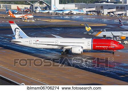 Picture - A Norwegian Air United Kingdom Boeing 787-9 with registration G-CKWC at London Gatwick Airport, United Kingdom, Europe. Fotosearch