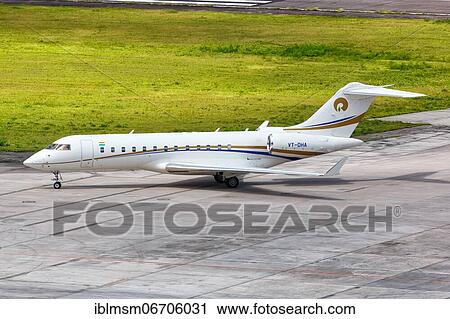 Stock Image - A private Bombardier Global Express BD-700-1A10 with registration VT-DHA at Mahe Airport (SEZ), Seychelles, Africa. Fotosearch