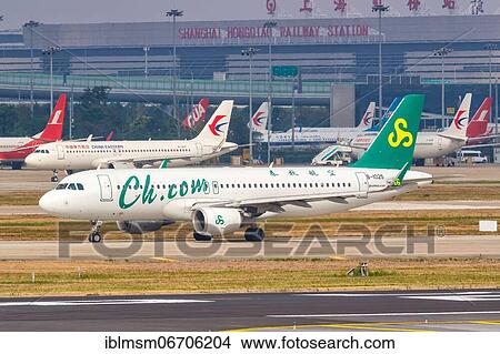 A Spring Airlines Airbus A320 with registration number B-1025 at Shanghai Airport, China, Asia View Large Photo Image Picture - A Spring Airlines Airbus A320 with registration number B-1025 at Shanghai Airport, China, Asia. Fotosearch