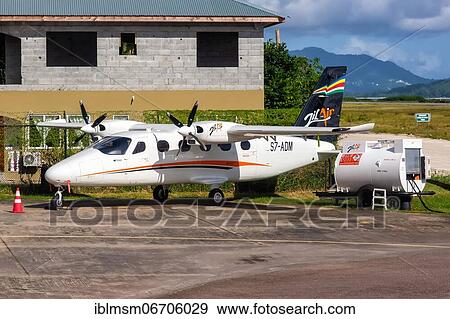 Stock Photo - A Tecnam P2012 aircraft of Zil Air with registration S7-ADM at Mahe Airport (SEZ), Seychelles, Africa. Fotosearch