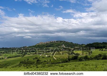 A town in Val d’Orcia on a hill, surrounded by farms and fields, Montepulciano, Tuscany, Italy, Europe View Large Photo Image Stock Image - A town in Val d’Orcia on a hill, surrounded by farms and fields, Montepulciano, Tuscany, Italy, Europe. Fotosearch