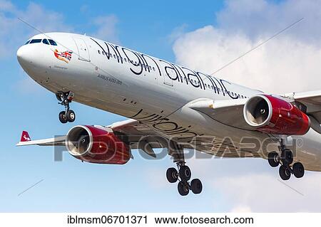 A Virgin Atlantic Airbus A330-300 with the registration G-VGEM lands at London Heathrow Airport, United Kingdom, Europe View Large Photo Image Stock Image - A Virgin Atlantic Airbus A330-300 with the registration G-VGEM lands at London Heathrow Airport, United Kingdom, Europe. Fotosearch