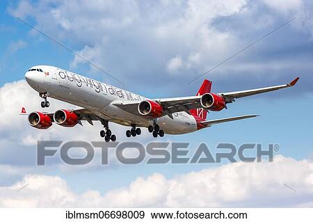 A Virgin Atlantic Airbus A340-600 with registration G-VNAP lands at London Heathrow Airport, United Kingdom, Europe View Large Photo Image Stock Photo - A Virgin Atlantic Airbus A340-600 with registration G-VNAP lands at London Heathrow Airport, United Kingdom, Europe. Fotosearch