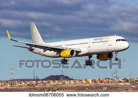 A Vueling Airbus A321 aircraft with registration EC-MMH at Tenerife South Airport (TFS) in Tenerife, Spain, Europe View Large Photo Image Stock Photography - A Vueling Airbus A321 aircraft with registration EC-MMH at Tenerife South Airport (TFS) in Tenerife, Spain, Europe. Fotosearch