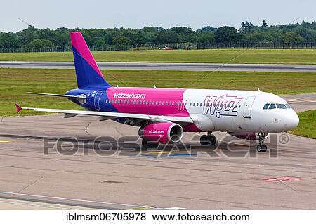 A Wizzair Airbus A320 with registration number HA-LWD at London Airport, United Kingdom, Europe View Large Photo Image Stock Photo - A Wizzair Airbus A320 with registration number HA-LWD at London Airport, United Kingdom, Europe. Fotosearch