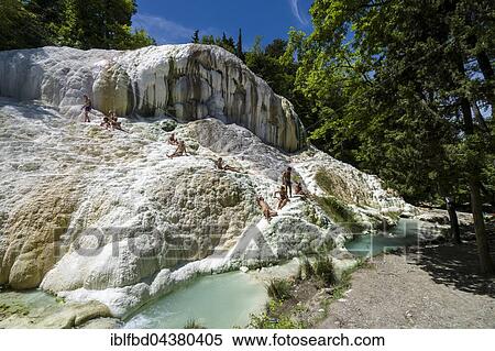 Accumulated white minerals and the pools of the hot springs of Bagni San Filippo in the middle of the forest, Castiglione d’Orcia, Tuscany, Italy, Europe View Large Photo Image Stock Photography - Accumulated white minerals and the pools of the hot springs of Bagni San Filippo in the middle of the forest, Castiglione d’Orcia, Tuscany, Italy, Europe. Fotosearch