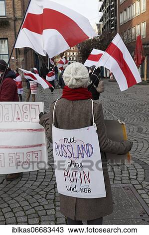 Stock Image - Activist carries sign, Russia without Putin and KGB, Belarus solidarity rally at the market square in Düsseldorf's old town on Jan. 23, 2021, Düsseldorf, North Rhine-Westphalia, Germany, Europe. Fotosearch