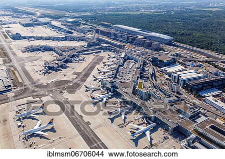 Aerial view Terminal 1 and Lufthansa aircraft at Frankfurt FRA Airport during the Corona Virus COVID-19 in Frankfurt, Germany, Europe View Large Photo Image Picture - Aerial view Terminal 1 and Lufthansa aircraft at Frankfurt FRA Airport during the Corona Virus COVID-19 in Frankfurt, Germany, Europe. Fotosearch
