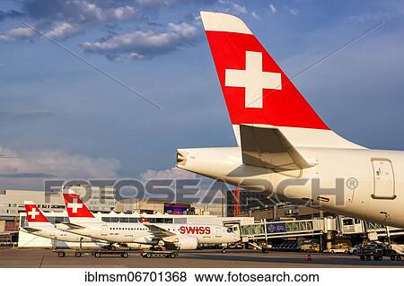 Airbus A220-300 aircraft Tails of Swiss at Zurich Airport (ZRH) in Switzerland View Large Photo Image Stock Photo - Airbus A220-300 aircraft Tails of Swiss at Zurich Airport (ZRH) in Switzerland. Fotosearch