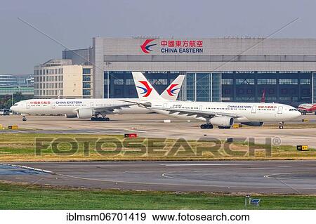 Airbus and Boeing aircraft of China Eastern Airlines at Shanghai Airport, China, Asia View Large Photo Image Stock Photo - Airbus and Boeing aircraft of China Eastern Airlines at Shanghai Airport, China, Asia. Fotosearch