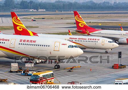 Airbus and Boeing aircraft of Hainan Airlines at Beijing Airport, China, Asia View Large Photo Image Stock Photo - Airbus and Boeing aircraft of Hainan Airlines at Beijing Airport, China, Asia. Fotosearch