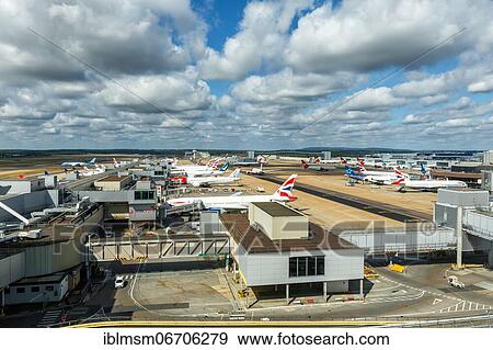Aircraft at London Gatwick Airport, United Kingdom, Europe View Large Photo Image Stock Photo - Aircraft at London Gatwick Airport, United Kingdom, Europe. Fotosearch