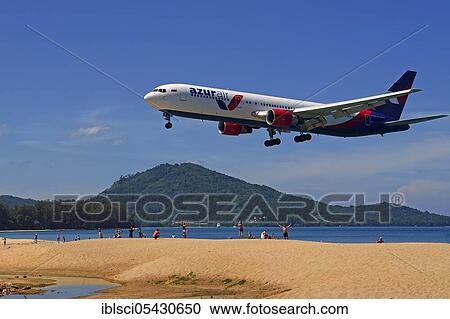 Aircraft Azur Air, landing approach, Mai Kao Beach, Phuket, Thailand, Asia View Large Photo Image Stock Image - Aircraft Azur Air, landing approach, Mai Kao Beach, Phuket, Thailand, Asia. Fotosearch