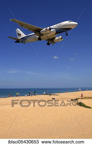 Aircraft of the company Bangkok Air, landing approach, Mai Kao Beach, Phuket, Thailand, Asia View Large Photo Image Stock Image - Aircraft of the company Bangkok Air, landing approach, Mai Kao Beach, Phuket, Thailand, Asia. Fotosearch