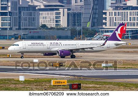 An Air Macau Airbus A321 with registration B-MCA at Shanghai Airport, China, Asia View Large Photo Image Stock Photo - An Air Macau Airbus A321 with registration B-MCA at Shanghai Airport, China, Asia. Fotosearch