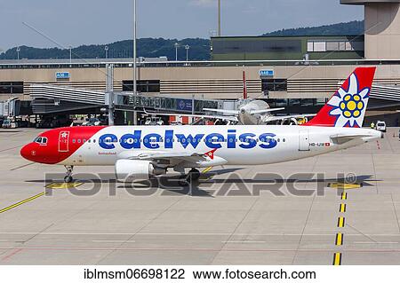 Stock Image - An Airbus A320 aircraft of Edelweiss with registration HB-IJW at Zurich Airport, Switzerland, Europe. Fotosearch