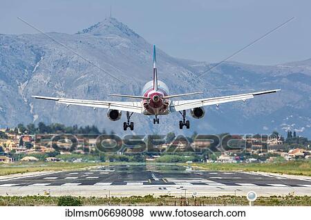 An Airbus A320 aircraft of Eurowings lands at Corfu airport, Greece, Europe View Large Photo Image Stock Photo - An Airbus A320 aircraft of Eurowings lands at Corfu airport, Greece, Europe. Fotosearch