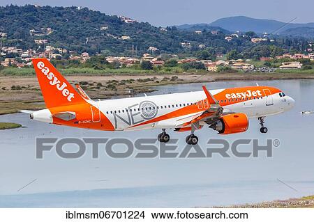 An Airbus A320neo aircraft of EasyJet with registration G-UZHC at Corfu Airport (CFU), Corfu, Greece, Europe View Large Photo Image Picture - An Airbus A320neo aircraft of EasyJet with registration G-UZHC at Corfu Airport (CFU), Corfu, Greece, Europe. Fotosearch