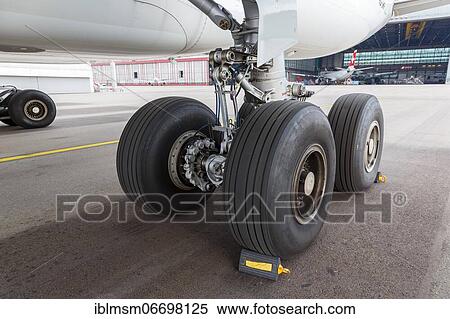 An Airbus A330-300 aircraft landing gear of Swiss with the registration HB-JHF at Zurich airport, Switzerland, Europe View Large Photo Image Stock Photography - An Airbus A330-300 aircraft landing gear of Swiss with the registration HB-JHF at Zurich airport, Switzerland, Europe. Fotosearch