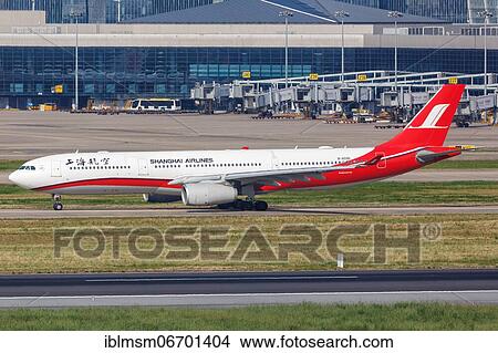 An Airbus A330-300 aircraft of Shanghai Airlines with registration number B-6096 at Shanghai airport, China, Asia View Large Photo Image Picture - An Airbus A330-300 aircraft of Shanghai Airlines with registration number B-6096 at Shanghai airport, China, Asia. Fotosearch