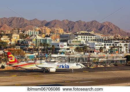 An Arkia Airbus A321LR with registration number 4X-AGK at Eilat Airport, Israel, Asia View Large Photo Image Stock Photograph - An Arkia Airbus A321LR with registration number 4X-AGK at Eilat Airport, Israel, Asia. Fotosearch